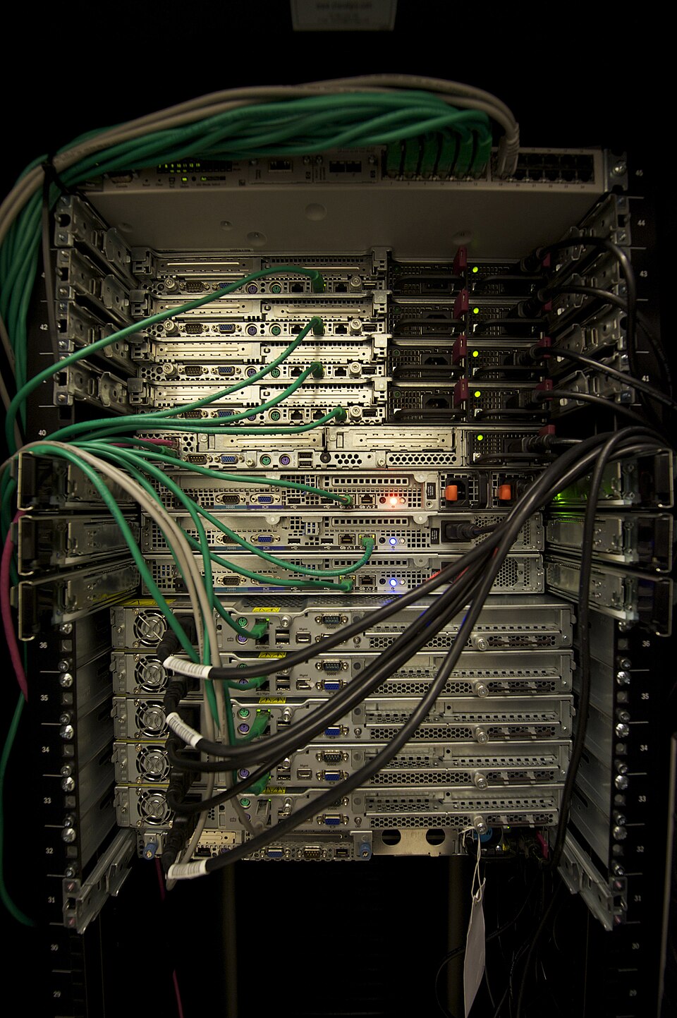 A rack of production servers with network cabling